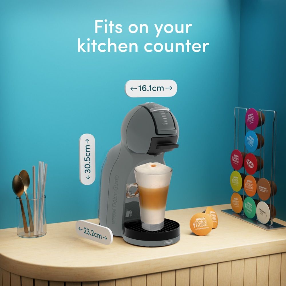Mini Me 2 Anthracite capsule coffee machine in a kitchen coffee corner with its dimensions.