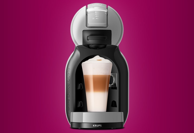 Coffee machine on purple background
